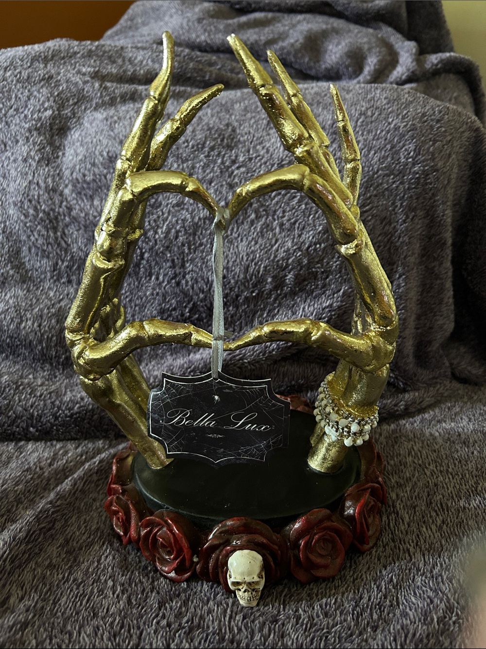 Bella Luxx Gold Skeleton Hand Jewelry Holder with Red Rose Trim